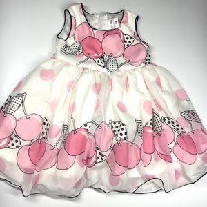 Pretty party frock with a lace shrug